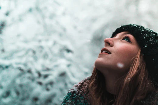 woman looking at snow